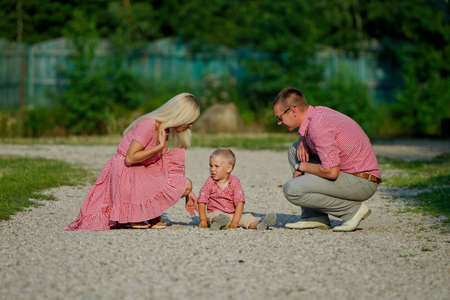 photo of young family parenting naughty sonの写真素材