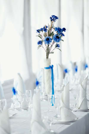 table setting in white and blue colors