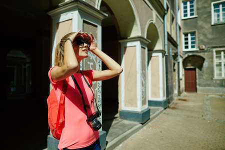 Beautiful girl tourist in the city portraitの写真素材