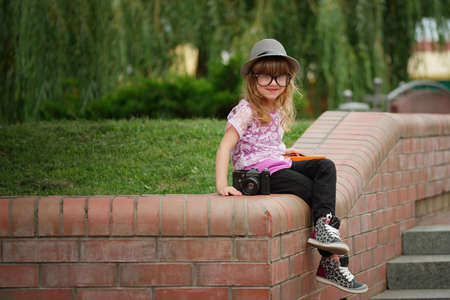 photo of little hipster girl with big glassesの写真素材