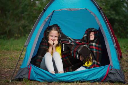 photo of happy children hiking in the forestの写真素材