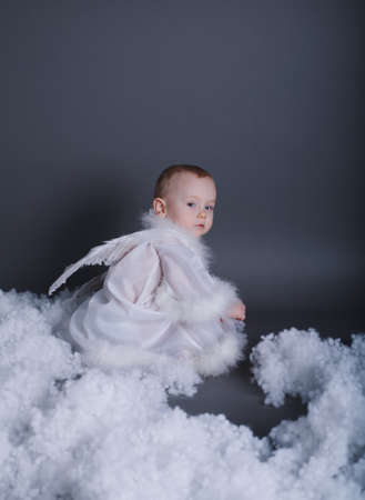 little beautiful boy like angel in the skyの写真素材