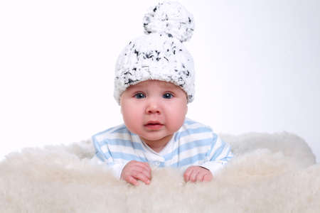 photo of cute little boy with funny hatの写真素材