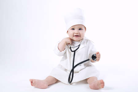 photo of cute little boy playing doctorの写真素材