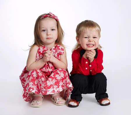 lovely boy and girl on whiteの写真素材