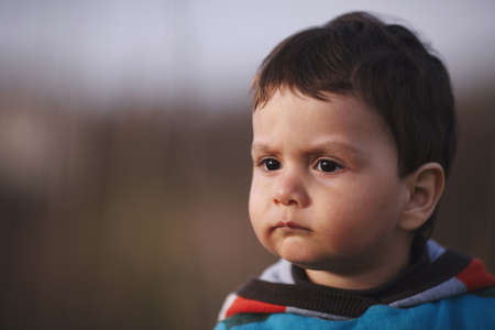 portrait of little serious boy