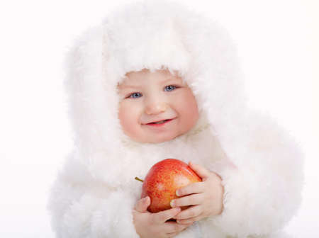 cute baby with rabbit costumeの写真素材