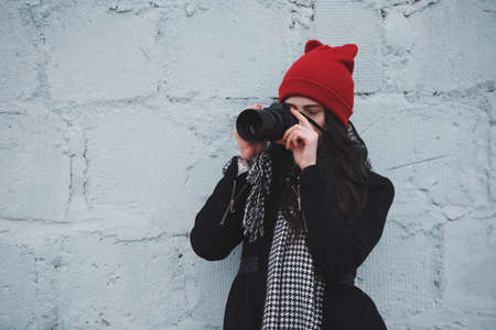 young beautiful girl with red hatの写真素材