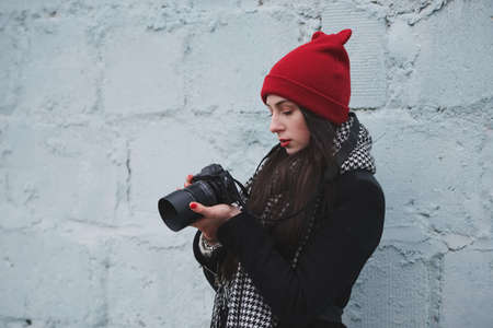 young beautiful girl with red hatの写真素材