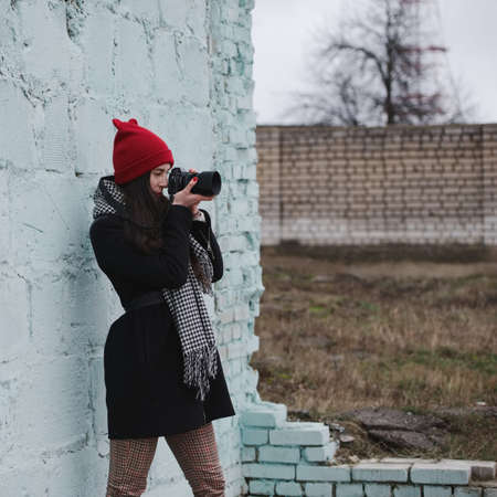 young beautiful girl with red hatの写真素材