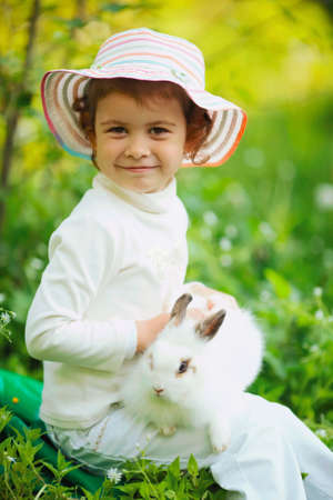 cute little girl with white rabbitの写真素材