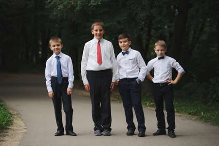 young boys in uniform outdoorsの写真素材