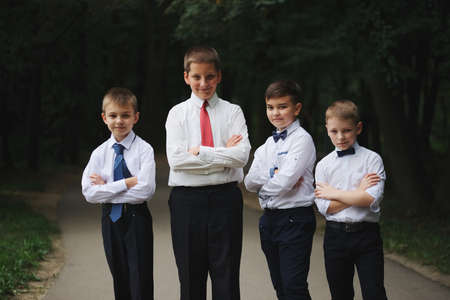 young boys in uniform outdoorsの写真素材