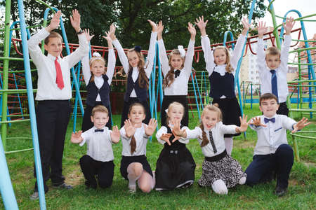 pupils playing on the break outdoorsの写真素材
