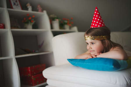 little girl lying and dreamingの写真素材