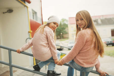 two beautiful girls on the streetの写真素材