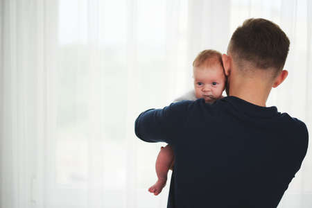 young happy father with cute babyの写真素材