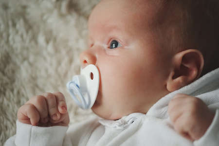 Portrait of little beautiful baby boyの写真素材