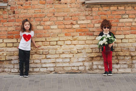 little boy and girl on the streetの写真素材