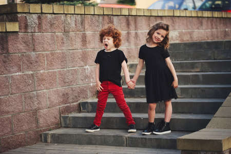 boy and girl on the streetの写真素材
