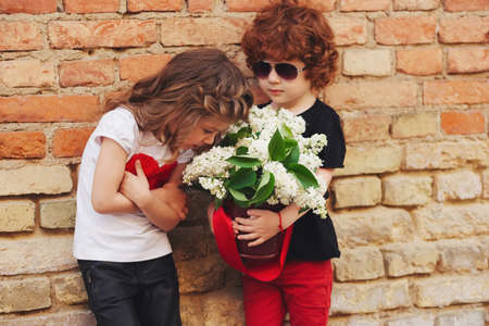 little boy and girl on the streetの写真素材
