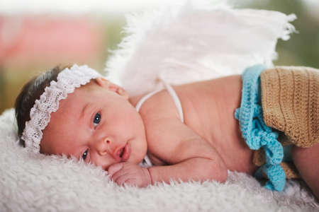 cute little cupid with wingsの写真素材