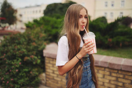 beautiful young girl with long hairの写真素材