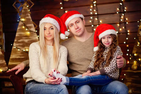 photo of happy family celebrating christmas at home