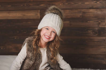 cute little girl with knitted hatの写真素材