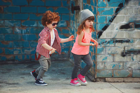 hipster boy and girl in parkの写真素材