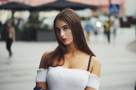 beautiful brunette girl on the street