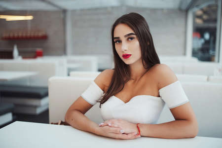 beautiful brunette girl on the streetの写真素材