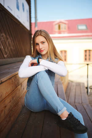 beautiful blonde girl on the streetの写真素材