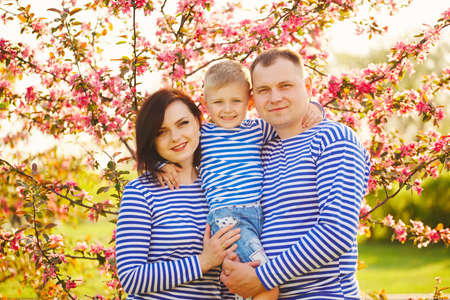 happy family in summer parkの写真素材