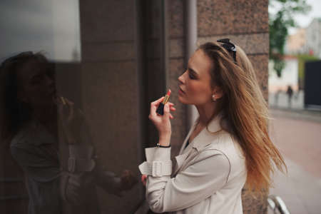 beautiful blonde girl in the streetの写真素材