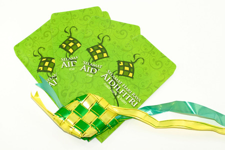 May 2016,12 - Kuala Lumpur, Malaysia : A close-up of 'Duit Raya' which is money given from adult to children during Eid al-Fitr celebration in Malaysia.のeditorial素材