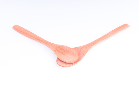 Wooden spoon isolated on white backgroundの写真素材