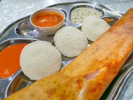 Masala Dosa and Idli Dosa food closeup with selective focus and crop fragment. It is a popular South Indian all time foodの写真素材