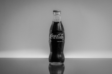 Kuala Lumpur, Malaysia - February 18,2019: Coca Cola drink on Black and White. Selective focus and...