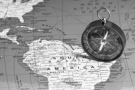 Kuala Lumpur, MALAYSIA FEBRUARY 27, 2019: Compass on world map background. Selective focus,Business and Travel Concept. Black and Whiteのeditorial素材