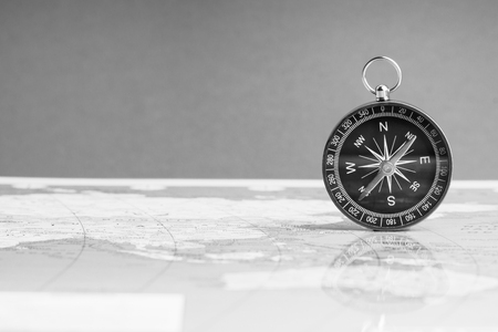 Kuala Lumpur, MALAYSIA FEBRUARY 27, 2019: Compass on world map background. Selective focus,Business and Travel Concept. Black and Whiteのeditorial素材