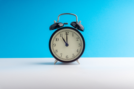 Alarm Clock on colorful background with selective focus and crop fragment. Copy space conceptの写真素材
