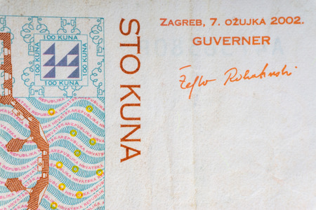 Croatian KUNA or STO KUNA money currency closeup. Selective focus and crop fragment