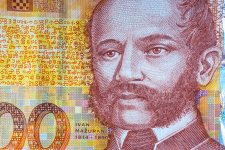 Croatian KUNA or STO KUNA money currency closeup. Selective focus and crop fragment