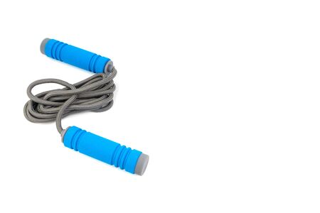 Skipping rope or jumping rope isolated on white background. Selective focus and crop fragment