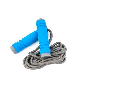 Skipping rope or jumping rope isolated on white background. Selective focus and crop fragmentの写真素材