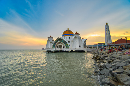 Kuala Lumpur, Malaysia - June 24, 2019: Beautiful sunset over the Malacca Straits Mosque or Masjid Selat. Selective focusのeditorial素材