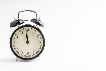 Alarm Clock isolated on white background with selective focus and crop fragmentの写真素材