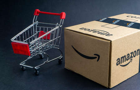 Kuala Lumpur, Malaysia - April 1, 2020 : Amazon Prime box or Amazon shipping box on black background. Crop fragment, business conceptのeditorial素材