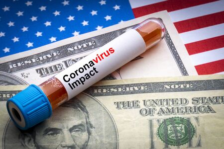 CORONAVIRUS IMPACT text, US Dollar and blood sample vacuum tube on America flags background....